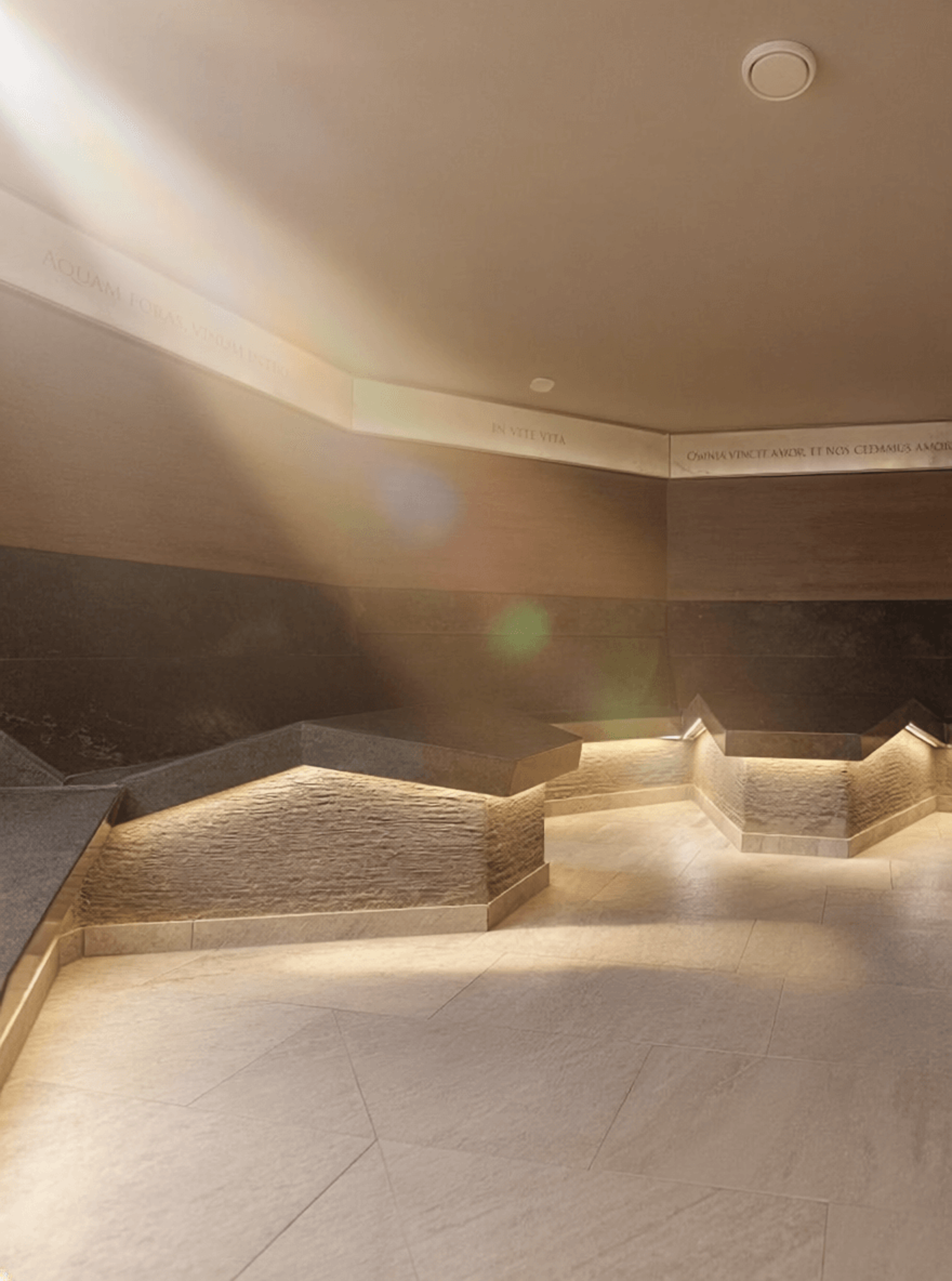 Interior with polygonal seating areas and indirect lighting in a historic bath