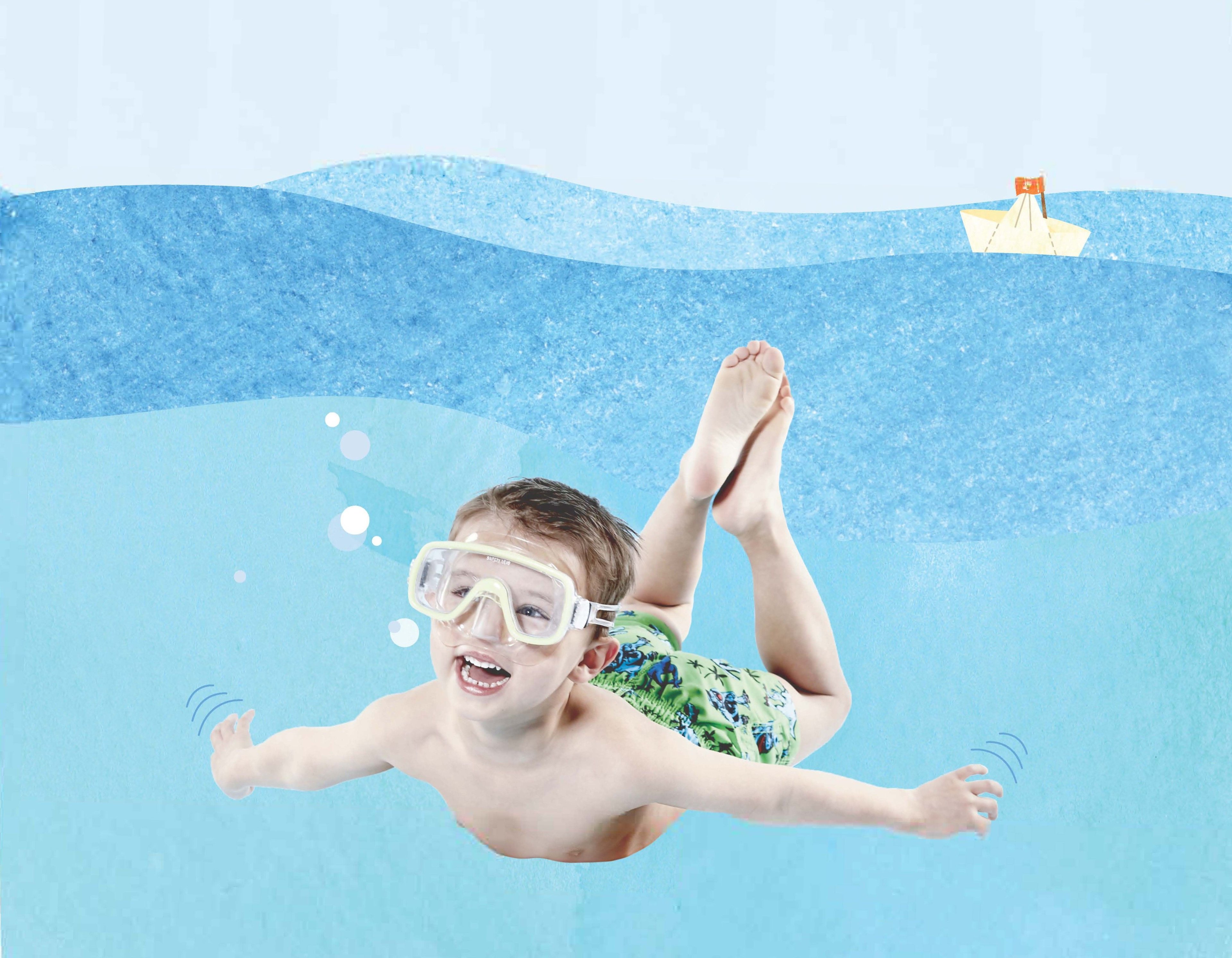 A toddler dives with diving goggles.