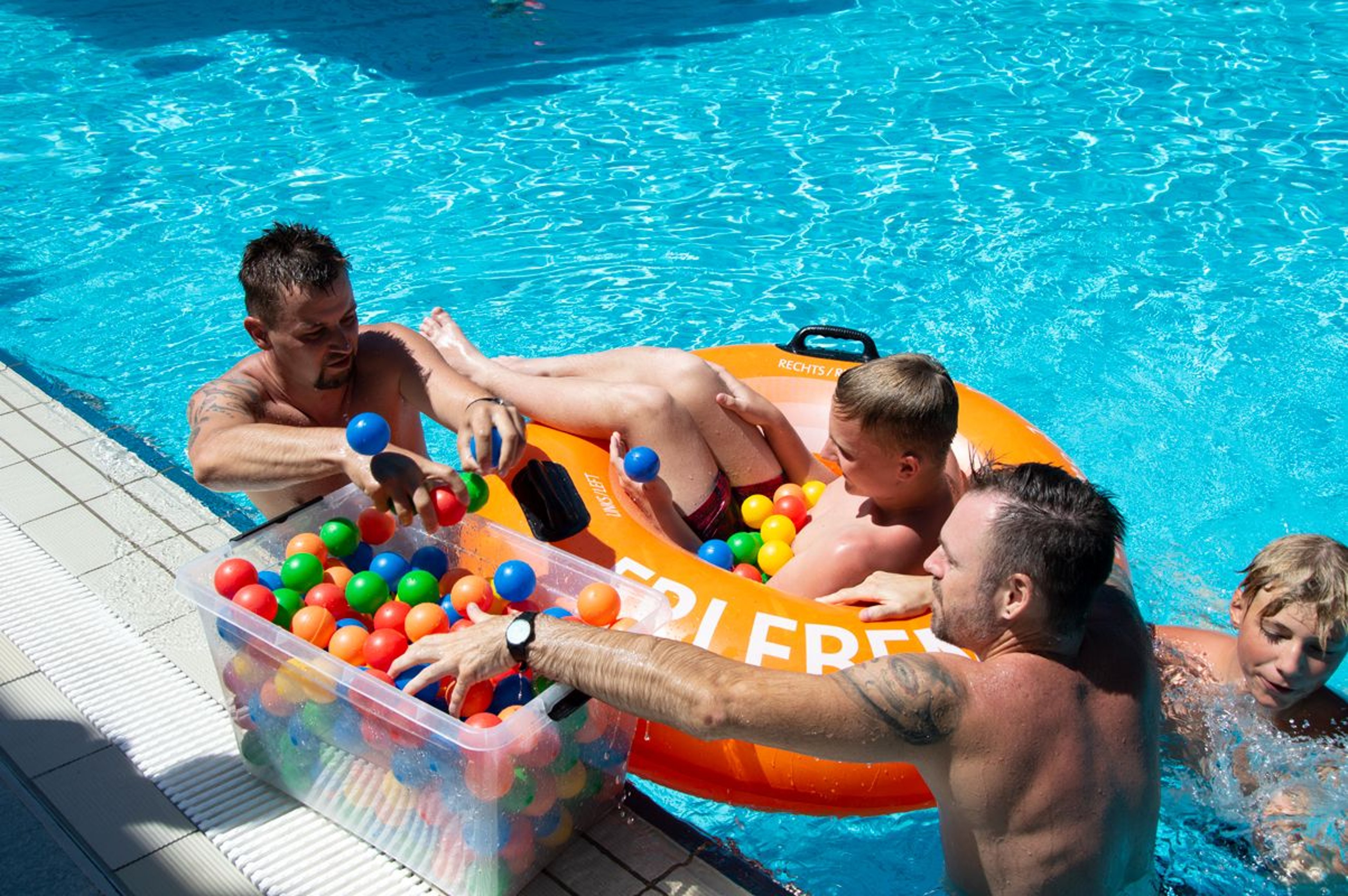 Family tries to fill a tire with balls