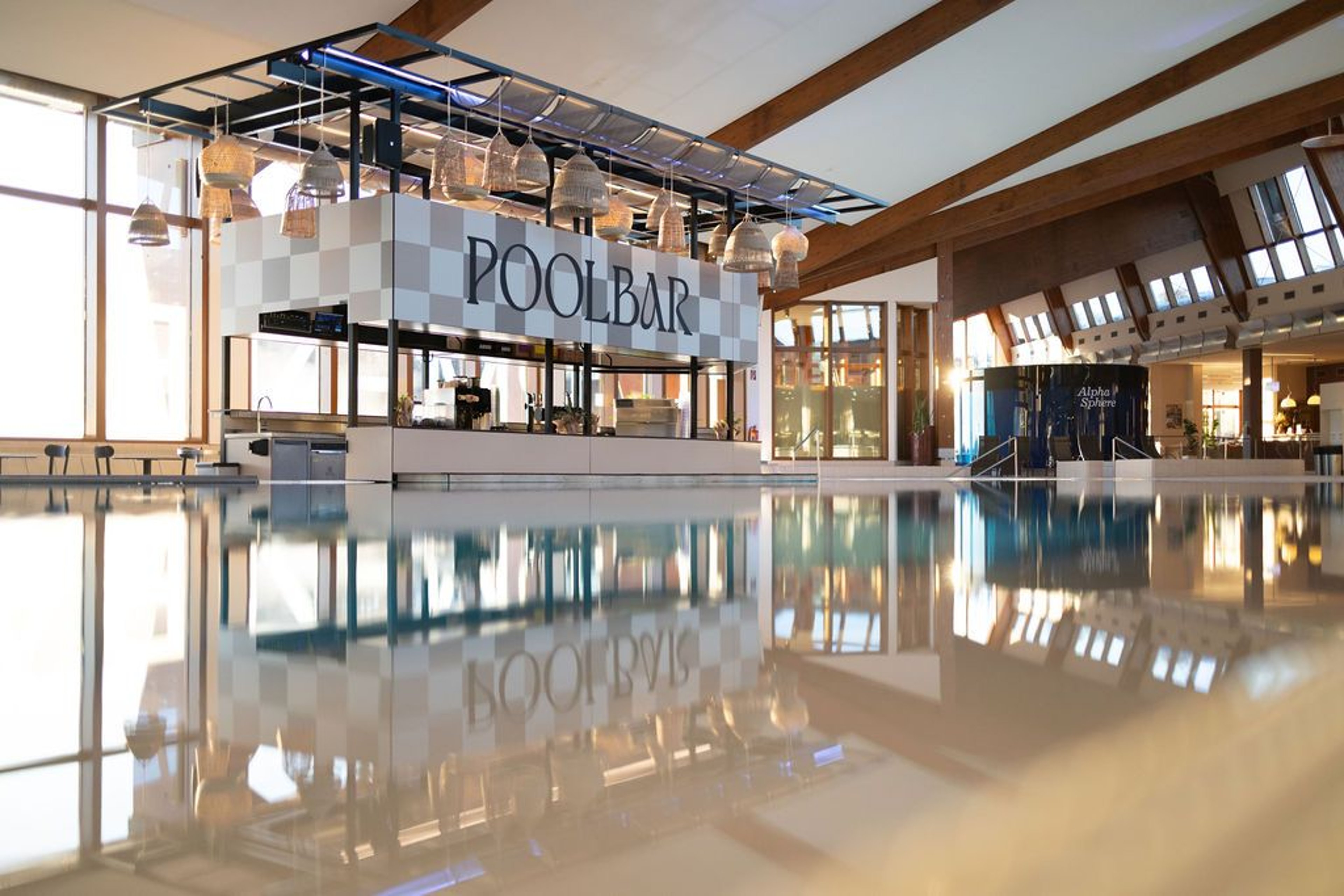 Pool bar reflected in the thermal water at the Loipersdorf thermal spa resort.