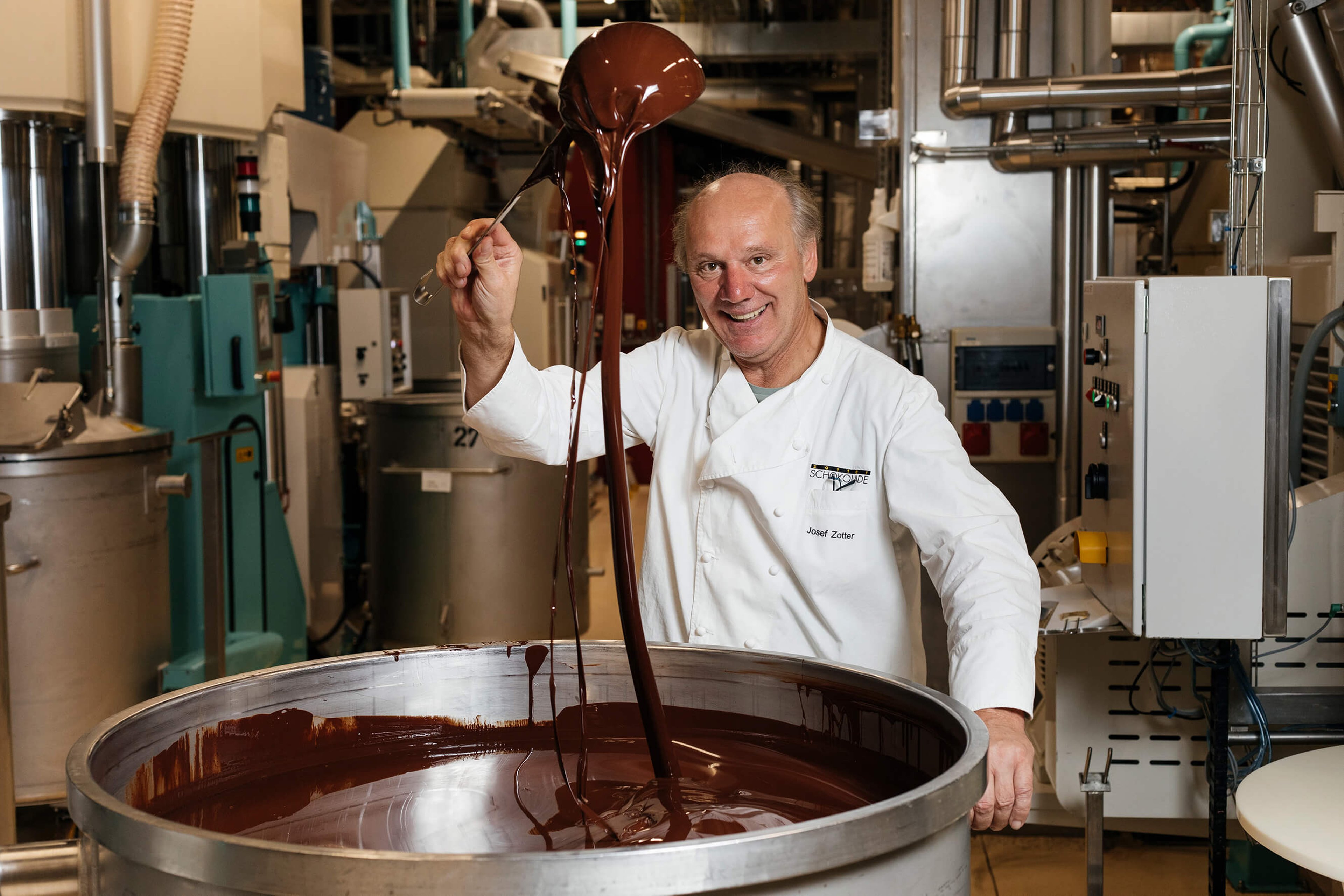 Mr. Zotter with a pot of chocolate.