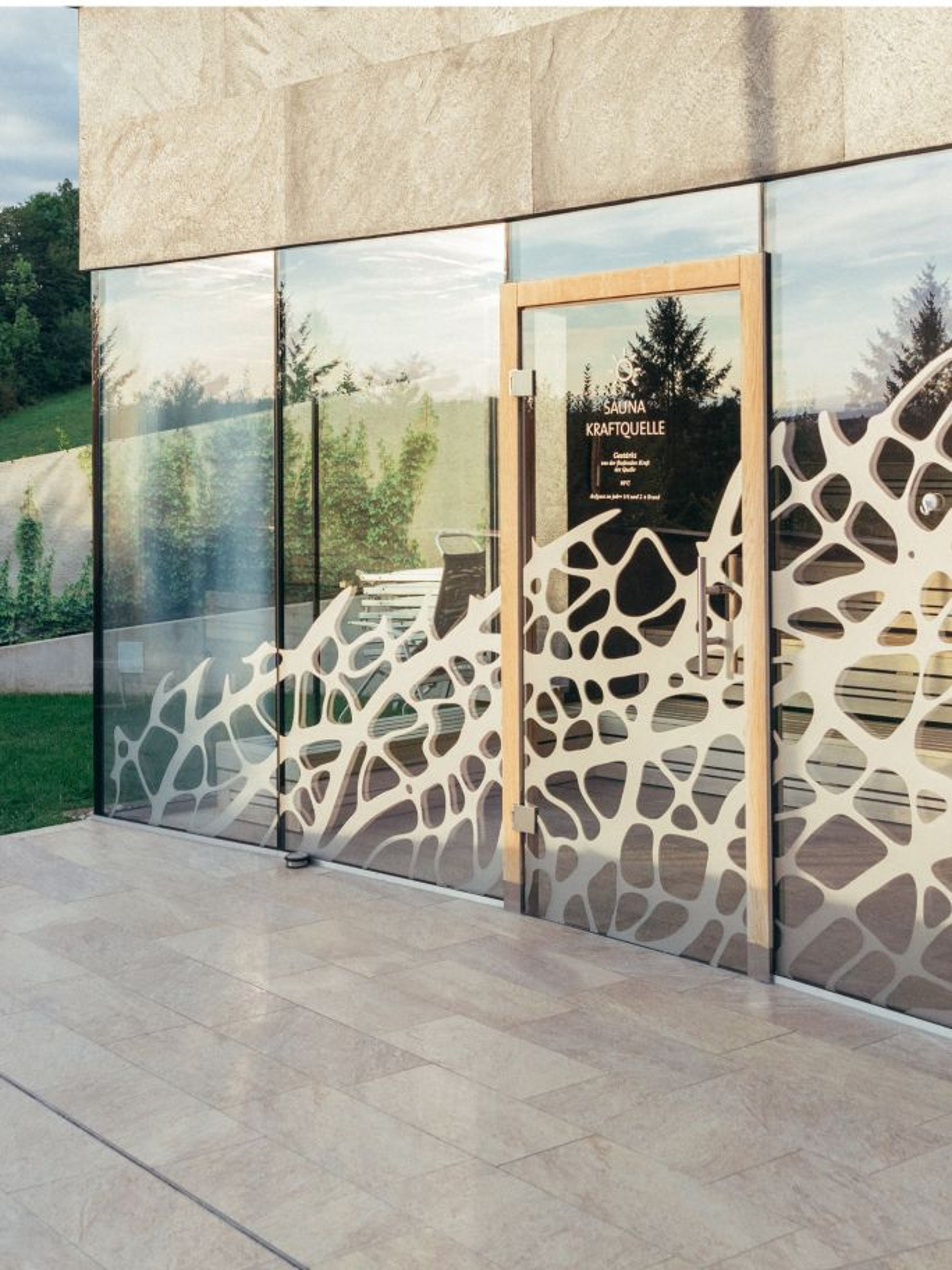 A view of the glazed entrance to the Kraftquelle infusion sauna at the Loipersdorf thermal spa resort.