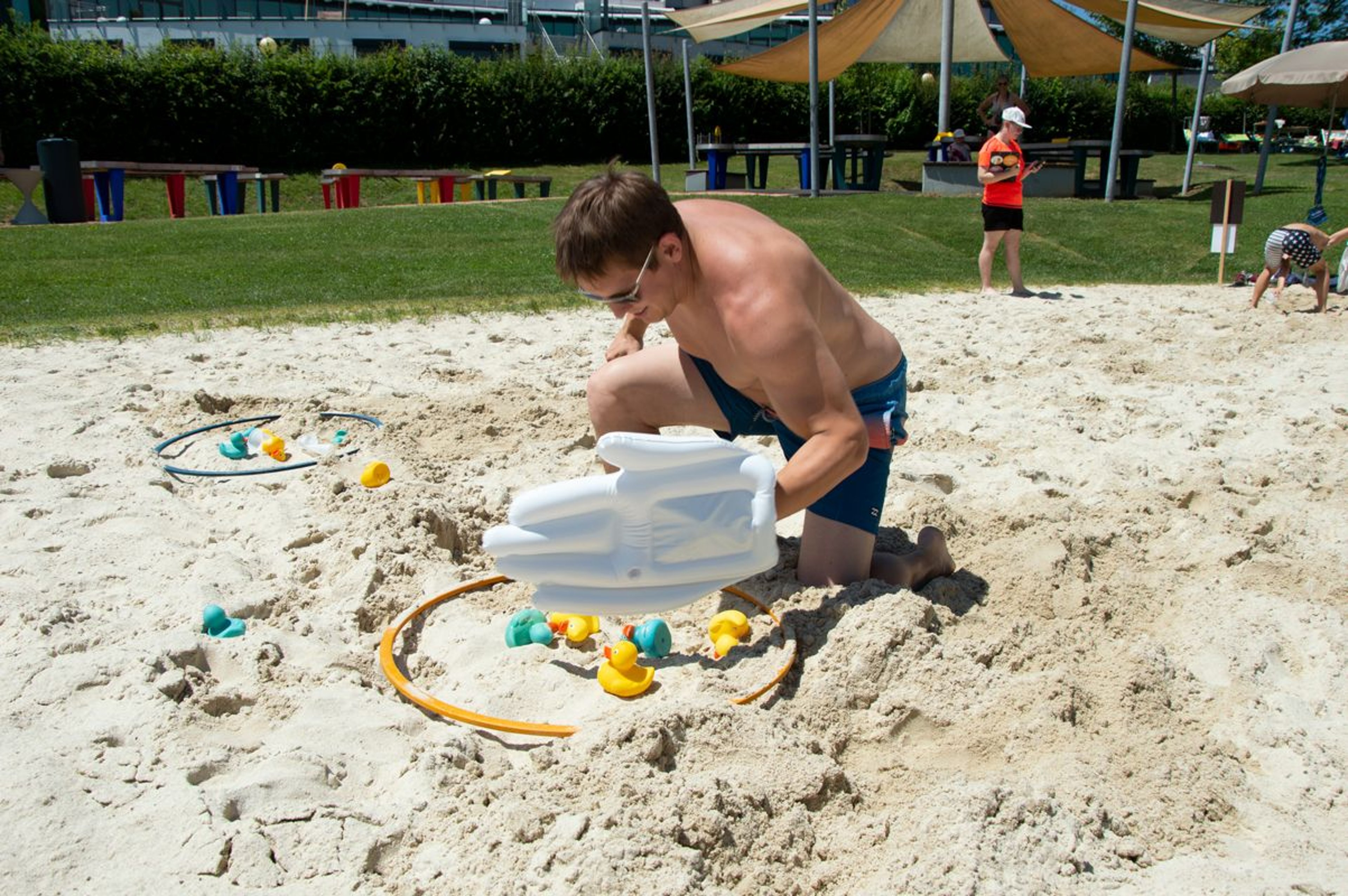 Man playing in the sand