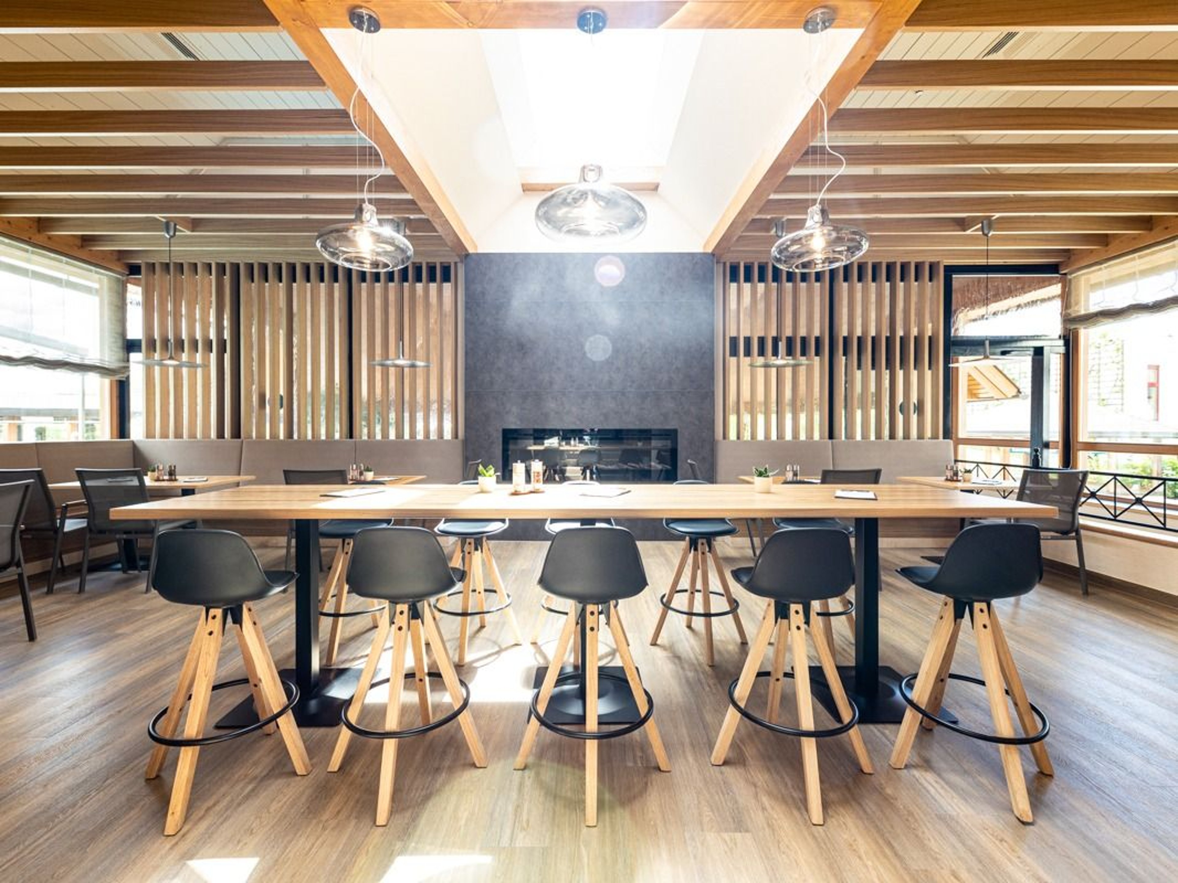 The dining room in the Schaffelbad with a view of the fireplace.
