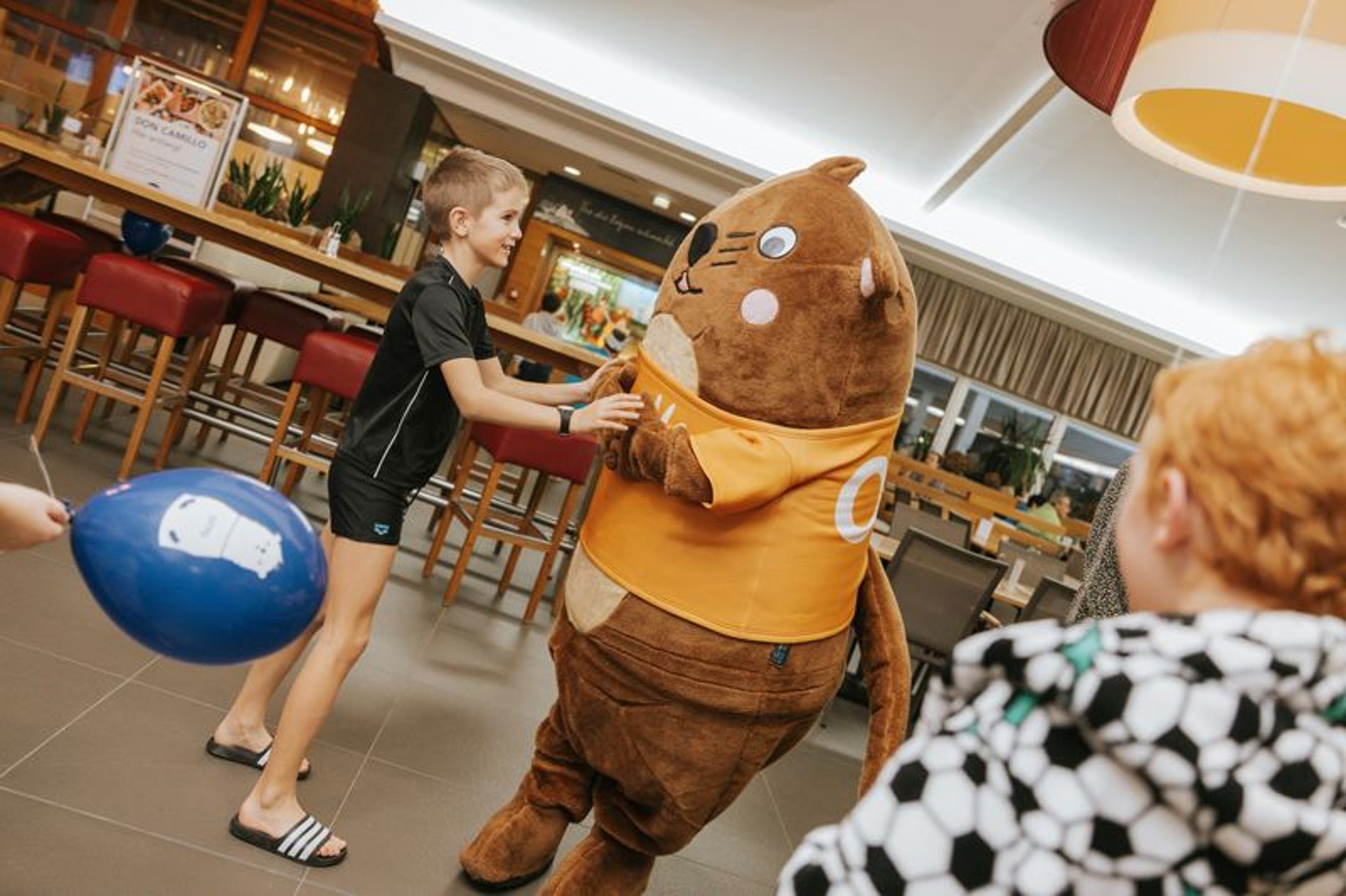 Otto dances the Otto dance with a child