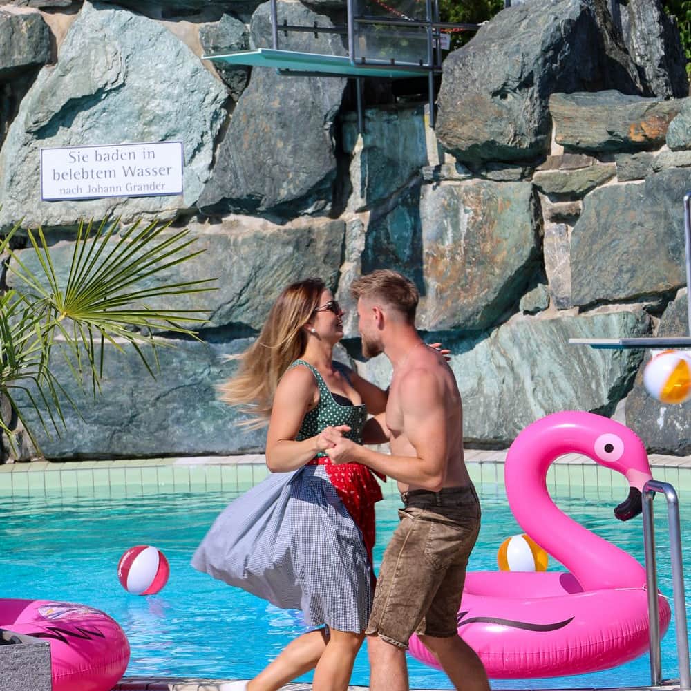A couple in traditional costume dancing at the Acapulco pool