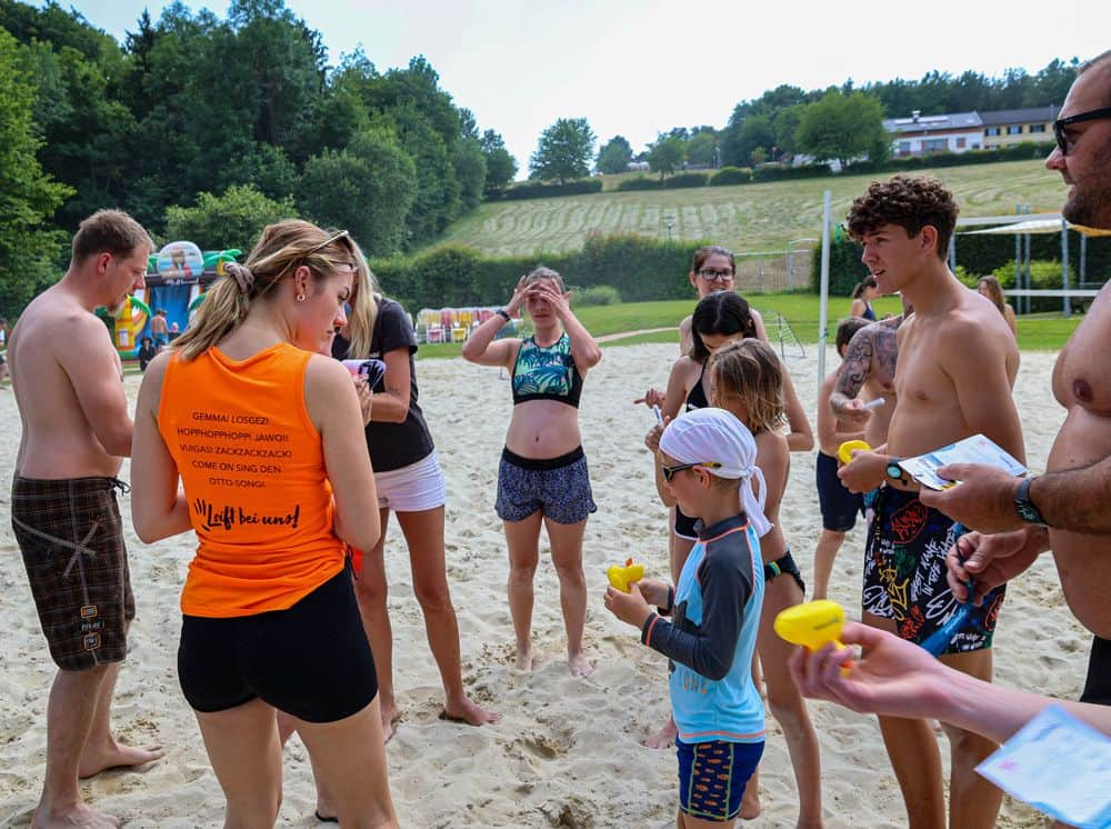 Children picking out the ducks