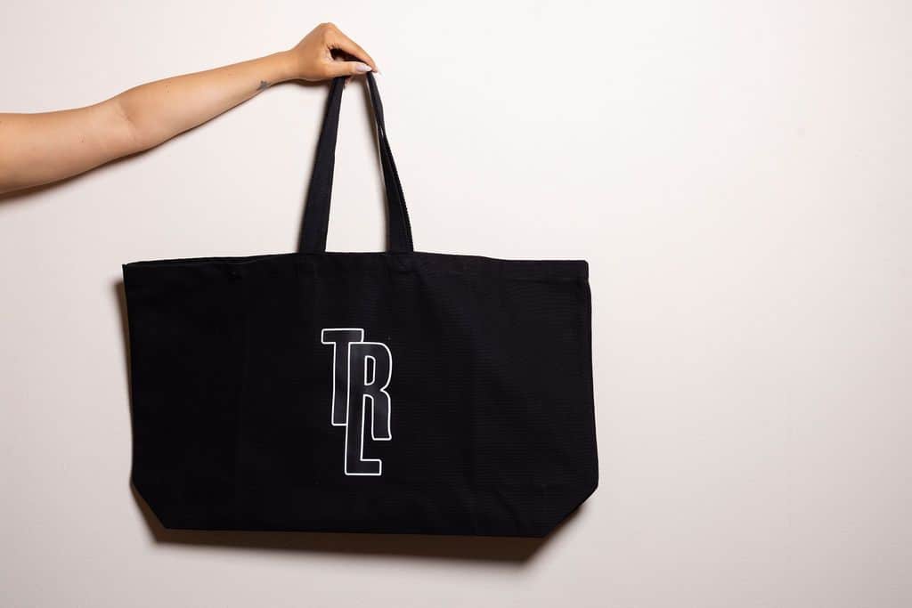 Functional black bathing bag with the Thermenresort Loipersdorf branding. Ideal for longer stays at the thermal spa resort.