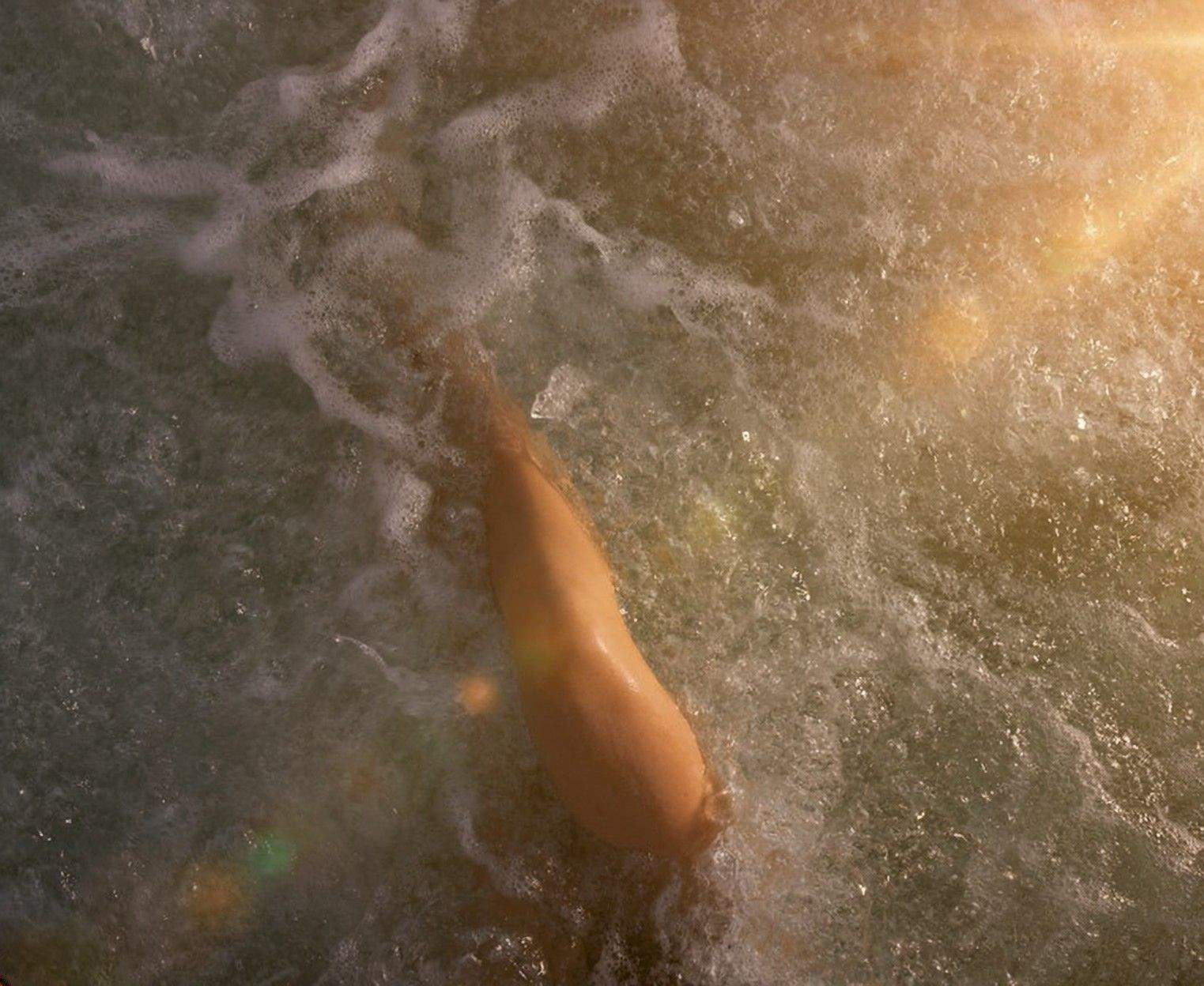 One leg in sparkling water