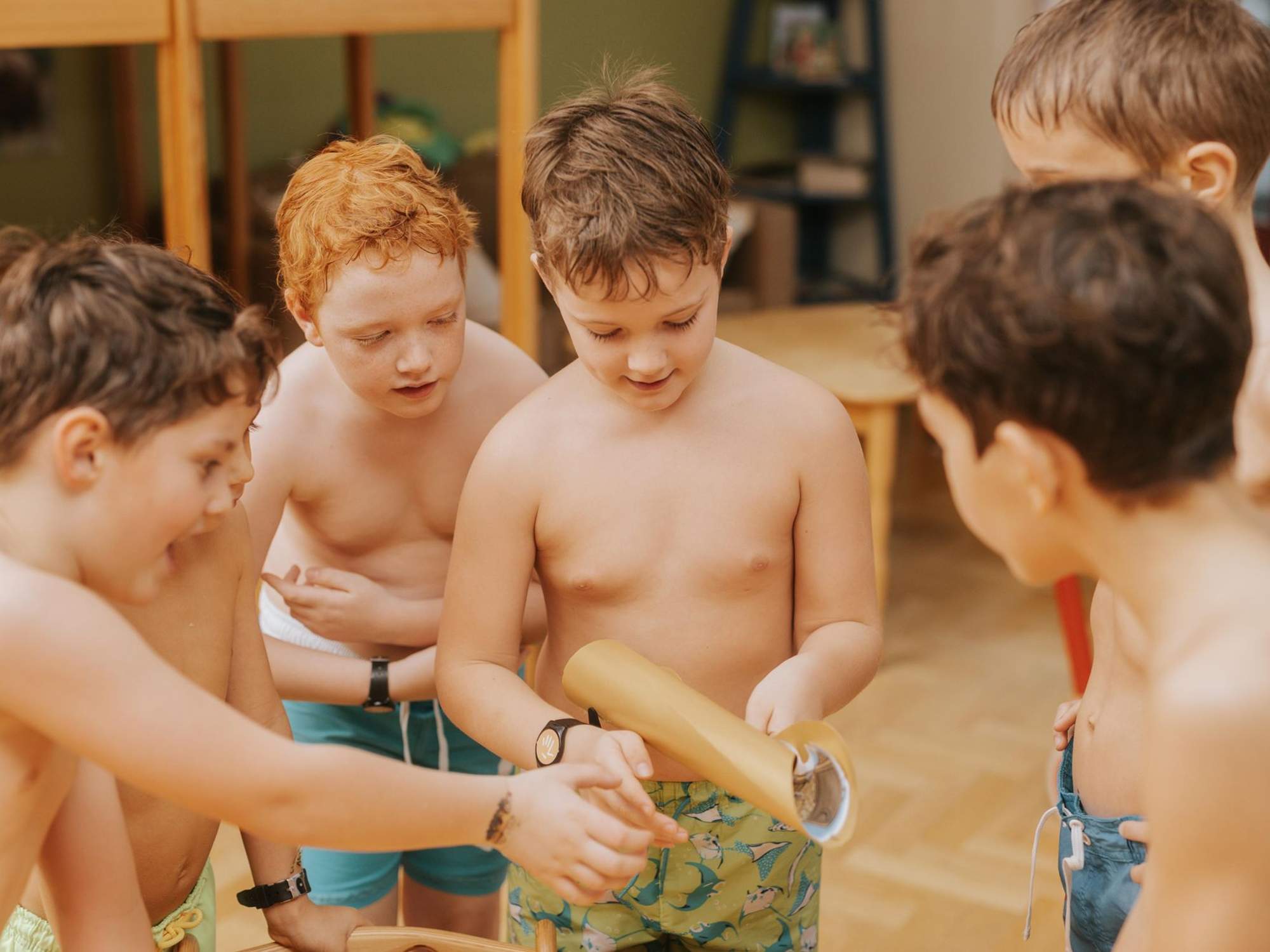Children find clues for their treasure hunt.
